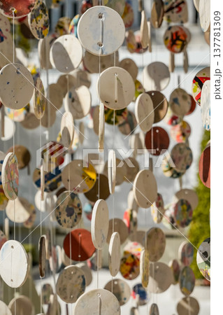 Decorative Art Installation with Painted Ceramic Discs Decorative Art Installation with Painted Ceramic Discs 137781309