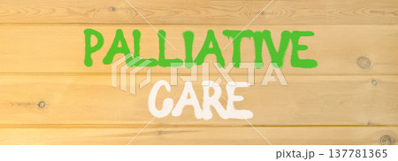 Palliative care words symbol. Concept words Palliative care on beautiful wooden wall. Beautiful wooden wall background. Medical and Palliative care words concept. Copy space. 137781365