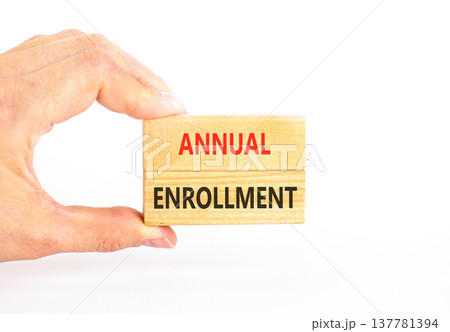 Annual enrollment words symbol. Concept words Annual enrollment on beautiful wooden blocks. Beautiful white background. Doctor hand. Medical and Annual enrollment words concept. Copy space. Annual enrollment words symbol. Concept words Annual enrollment on beautiful wooden blocks. Beautiful white background. Doctor hand. Medical and Annual enrollment words concept. Copy space. 137781394