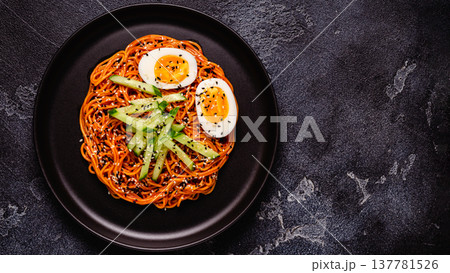 Korean traditional food, cucumber and boiled egg cold spicy noodles. Korean traditional food, cucumber and boiled egg cold spicy noodles. 137781526
