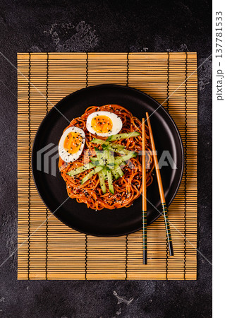 Korean traditional food, cucumber and boiled egg cold spicy noodles. Korean traditional food, cucumber and boiled egg cold spicy noodles. 137781533