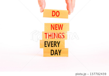 Do new things every day words symbol. Concept words Do new things every day on beautiful wooden blocks. Beautiful white paper background. Business do new things every day concept. Copy space. Do new things every day words symbol. Concept words Do new things every day on beautiful wooden blocks. Beautiful white paper background. Business do new things every day concept. Copy space. 137782439
