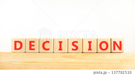 Decision word symbol. Concept word Decision on beautiful wooden blocks on wooden beam. Beautiful white background. Business support help decision word concept. Copy space. 137782510