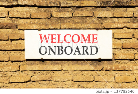 Welcome onboard symbol. Concept words Welcome onboard on beautiful big white sign plate. Beautiful old brown brick wall background. Business, motivational welcome onboard concept. Copy space. Welcome onboard symbol. Concept words Welcome onboard on beautiful big white sign plate. Beautiful old brown brick wall background. Business, motivational welcome onboard concept. Copy space. 137782540