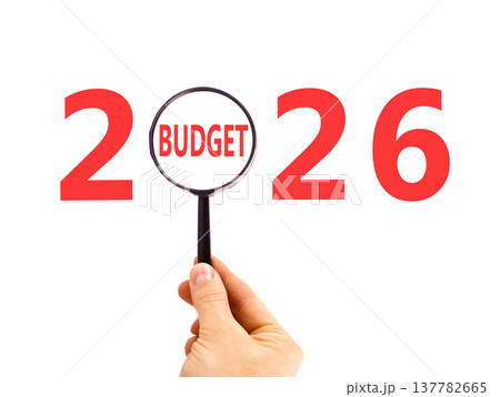 2026 budget symbol. Concept words 2026 budget in beautiful magnifying glass. Beautiful white background. Businessman's hand. Business 2026 budget concept. Copy space. 2026 budget symbol. Concept words 2026 budget in beautiful magnifying glass. Beautiful white background. Businessman's hand. Business 2026 budget concept. Copy space. 137782665