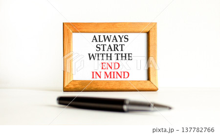 Start with the end in mind symbol. Concept words Always start with the end in mind on beautiful wooden picture frame. Beautiful white background. Business start with end in mind concept. Copy space. Start with the end in mind symbol. Concept words Always start with the end in mind on beautiful wooden picture frame. Beautiful white background. Business start with end in mind concept. Copy space. 137782766