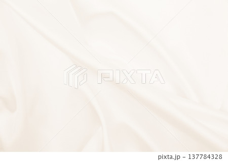 Smooth elegant golden silk or satin luxury cloth texture as wedding background. Luxurious background design. In Sepia toned. Retro style 137784328