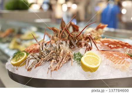 Seafood extravaganza featuring a vibrant platter on ice with fresh delicacies Generative AI 137784600