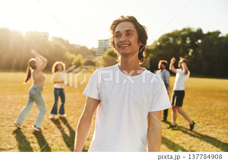 Young friends are having fun on the field 137784908
