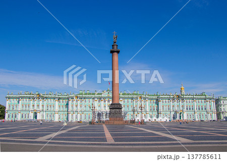 Russia, St. Petersburg, July 19, 2020 Palace Square, in the photo the building of the Hermitage and the Pillar of Alexandria, tourists walking around the square. 137785611