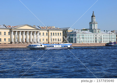 Russia, St. Petersburg, July 8, 2019, Kunstkamera. In the photo there is the Kunstkamera on the banks of the Neva and a boat with tourists, the famous museum of rarities. Russia, St. Petersburg, July 8, 2019, Kunstkamera. In the photo there is the Kunstkamera on the banks of the Neva and a boat with tourists, the famous museum of rarities. 137785640