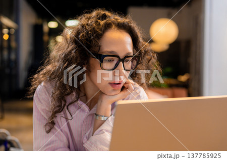 Young Caucasian woman using laptop computer typing on keyboard Young Caucasian woman using laptop computer typing on keyboard 137785925