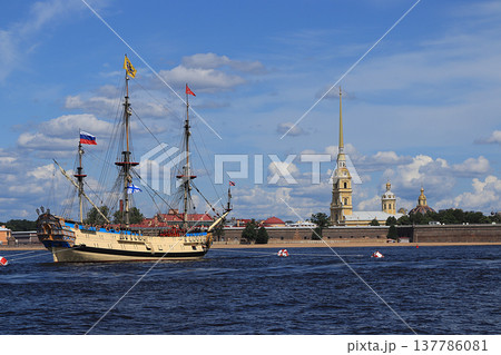 Russia, St. Petersburg, July 21, 2019, Frigate Poltava in the waters of the Neva and the Peter and Paul Fortress, preparing for the parade of the Navy. Russia, St. Petersburg, July 21, 2019, Frigate Poltava in the waters of the Neva and the Peter and Paul Fortress, preparing for the parade of the Navy. 137786081