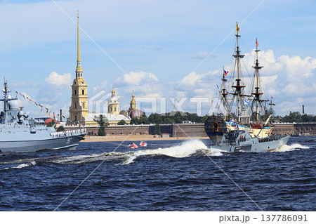 Russia, St. Petersburg, July 21, 2019, warships in the waters of the Neva and the Peter and Paul Fortress, preparation for the parade of the Navy, rehearsal. Russia, St. Petersburg, July 21, 2019, warships in the waters of the Neva and the Peter and Paul Fortress, preparation for the parade of the Navy, rehearsal. 137786091