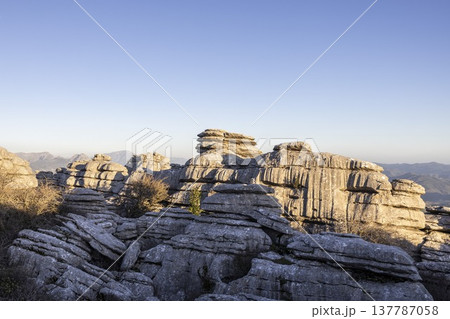 Exploring the unique rock formations at El Torcal in Spain during the early morning light Exploring the unique rock formations at El Torcal in Spain during the early morning light 137787058