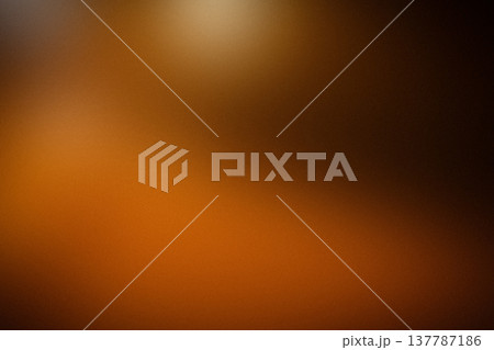 Abstract blurred background with warm tones of orange and brown, creating a soft gradient effect suitable for various design applications and artistic projects 137787186