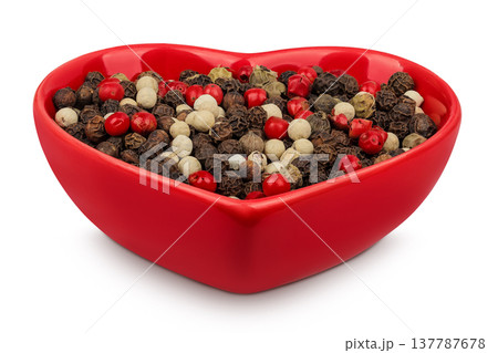 Pepper mix in a ceramic bowl isolated on white background. Pepper mix in a ceramic bowl isolated on white background. 137787678