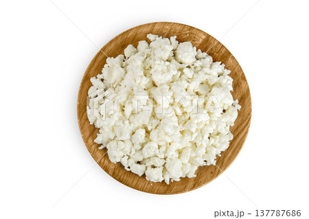 Cottage Cheese, Curd in wooden bowl isolated on white background. Top view. Flat lay 137787686