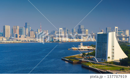 Tokyo, Japan - Oct 13 2024, Tokyo, Japan - Oct 2 2024, panoramic aerial view of Tokyo Bay cityscape in background and the Rainbow Bridge, in the foreground is a part of Odaiba Island, Tokyo, Japan Tokyo, Japan - Oct 13 2024, Tokyo, Japan - Oct 2 2024, panoramic aerial view of Tokyo Bay cityscape in background and the Rainbow Bridge, in the foreground is a part of Odaiba Island, Tokyo, Japan 137787919