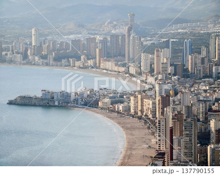 Beachfront Lively Scene, Bustling Coastal Street With Shops, Sunny Seaside Promenade Bustling With Activity 137790155