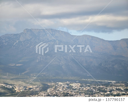 Dramatic Ridge Scene Highlighting Contrast, Atmospheric View Of Ridge With Varied Terrain And Lighting Dramatic Ridge Scene Highlighting Contrast, Atmospheric View Of Ridge With Varied Terrain And Lighting 137790157