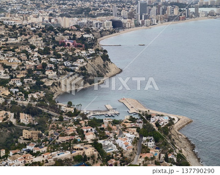 Horizon View Of City And Mountain Coast, Remote Urban Shoreline Surrounded By Hills And Calm Waters Horizon View Of City And Mountain Coast, Remote Urban Shoreline Surrounded By Hills And Calm Waters 137790290
