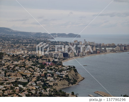 Serene Seaside City Under Cloudy Sky, Peaceful Urban Harbor With Steep Cliffs And Soft Lighting Serene Seaside City Under Cloudy Sky, Peaceful Urban Harbor With Steep Cliffs And Soft Lighting 137790296