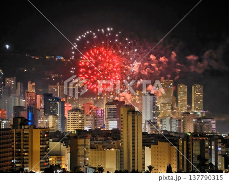 Bright Pyrotechnics Light Up City, Celebratory Firework Show Enhances Urban Holiday Visuals Beautifully 137790315