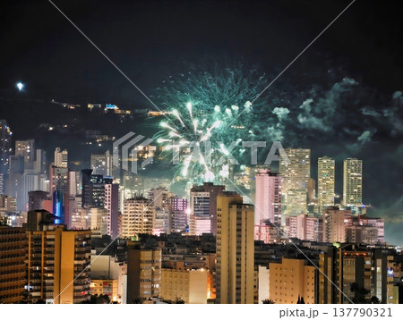 Night View Of Fireworks And City, Urban Night Scene With Fireworks And Romantic Balcony Lighting Night View Of Fireworks And City, Urban Night Scene With Fireworks And Romantic Balcony Lighting 137790321