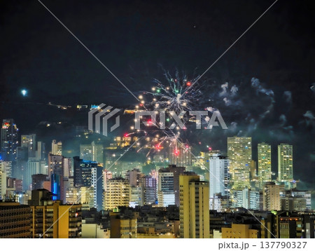 Dramatic Aerial Footage Captures Spectacular Fireworks Illuminating Dense City Skyline After Evening 137790327