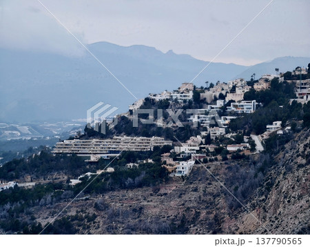 Tranquil Slope Side Community Overlooking Lush Valley With Winding Roads And Mountain Views 137790565