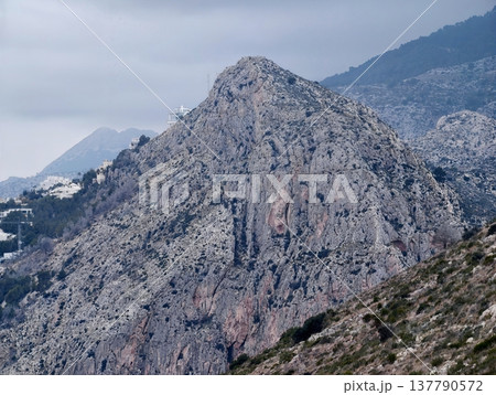 Cliff Face Illustration, Rugged Mountain Slope Showing Detailed Stratification And Sparse Flora Cliff Face Illustration, Rugged Mountain Slope Showing Detailed Stratification And Sparse Flora 137790572