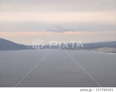 Calm Seaside Observation, Tranquil Coastal Scene Featuring Soft Clouds And Broad Shoreline Theme 137790583