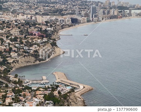 Bright Coastal Neighborhood With Cliffs, Sunlit Coastal Area Featuring Terraced Homes And Promenade Bright Coastal Neighborhood With Cliffs, Sunlit Coastal Area Featuring Terraced Homes And Promenade 137790600