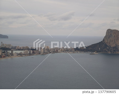 Seaside Cityscape Contrast, Coastal Urban Area With Natural Rock Formations And Shipping Activities Seaside Cityscape Contrast, Coastal Urban Area With Natural Rock Formations And Shipping Activities 137790605