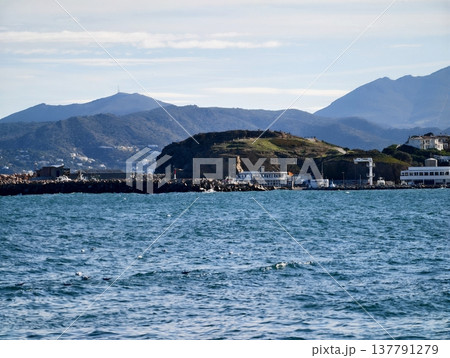 Harbor With Boats And Mountains, Marina Entrance Framed By Mountains Under Gentle Sky Ambiance 137791279