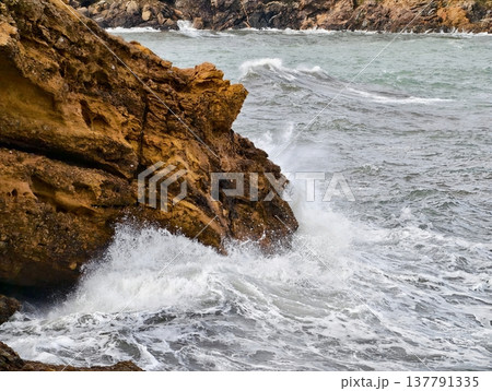Wild Sea Clashes With Rocks, Energetic Surf Colliding With Rugged Coastal Stones Vividly Captured Wild Sea Clashes With Rocks, Energetic Surf Colliding With Rugged Coastal Stones Vividly Captured 137791335