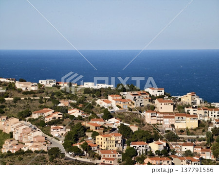 Harbor Town With Expansive Ocean View, Seaside Settlement Featuring Vibrant Rooftops And Distant Horizon Harbor Town With Expansive Ocean View, Seaside Settlement Featuring Vibrant Rooftops And Distant Horizon 137791586
