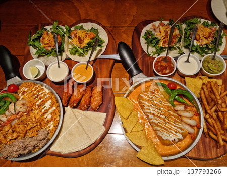 This is a Mexican food table setting.	 137793266