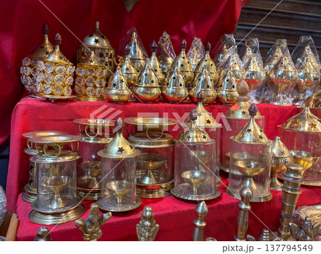 Collection of ornate brass incense burners, also known as "dhoop dani" or "incense holders. " Collection of ornate brass incense burners, also known as "dhoop dani" or "incense holders. " 137794549