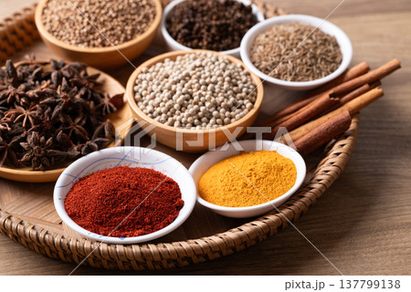 Cumin, turmeric powder, coriander seed, white peppercorn, chili powder, star anise and cinnamon Cumin, turmeric powder, coriander seed, white peppercorn, chili powder, star anise and cinnamon 137799138