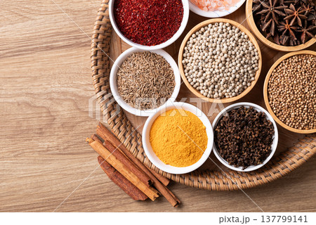 Cumin, turmeric powder, coriander seed, white peppercorn, chili powder, star anise and cinnamon Cumin, turmeric powder, coriander seed, white peppercorn, chili powder, star anise and cinnamon 137799141