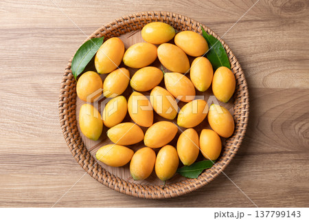 Fresh Marian plum (Mayongchid), Thai tropical fruit in summer season, Table top view Fresh Marian plum (Mayongchid), Thai tropical fruit in summer season, Table top view 137799143