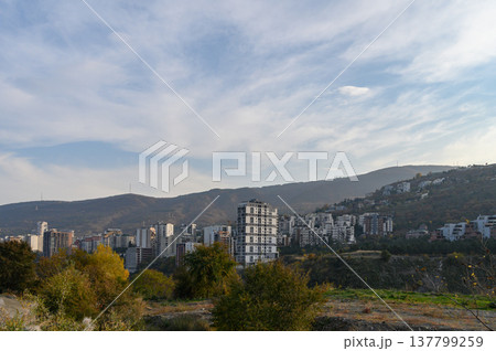 Contrast of Old Soviet-Era Buildings and New Modern Residential Complexes in the Saburtalo District, Tbilisi. 137799259