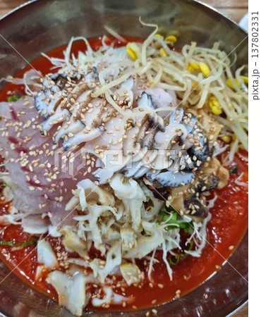 Among Korean foods, it is cold raw fish soup. Among Korean foods, it is cold raw fish soup. 137802331