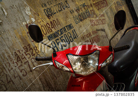 Moped against a wall Moped against a wall 137802835