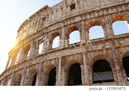 Explore the Colosseum in Rome during a clear sunny day 137803075