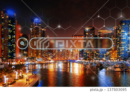 City lights reflect on water at night in a vibrant urban setting City lights reflect on water at night in a vibrant urban setting 137803095