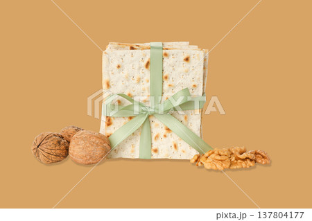 Traditional matzah with nuts and ribbon for Passover celebration 137804177
