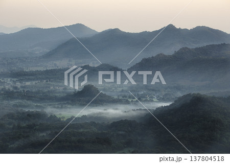 Fresh morning daylight illuminates the landscape softly. Quiet and peaceful morning scene in nature. 137804518